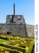 View at the ruins of Paco dos Condes in Barcelos. The town symbol is a rooster in Portuguese called Galo de Barcelos (Rooster of Barcelos). Стоковое фото, агентство Ingram Publishing / Фотобанк Лори