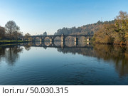Bridge of Ponte da Barca, ancient portuguese village, on Minho river, north of Portugal. Стоковое фото, агентство Ingram Publishing / Фотобанк Лори