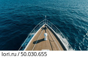 View of the sea from above and the bow of the ship. Generated by AI. Стоковое AI-изображение, AI-художник Анна Никонорова / Фотобанк Лори