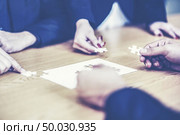 Finally finding solution concept with jigsaw. Стоковое фото, агентство Ingram Publishing / Фотобанк Лори