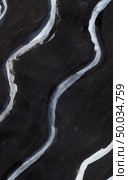 old paper drawn in white and black paint, textural background, wavy line. Стоковое фото, агентство Ingram Publishing / Фотобанк Лори