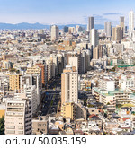 aerial view of Tokyo skylines and skyscrapers buildings in Shinjuku ward in Tokyo. Taken from Tokyo Bunkyo civic center observatory sky desk. . Стоковое фото, агентство Ingram Publishing / Фотобанк Лори