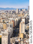 aerial view of Tokyo skylines and skyscrapers buildings in Shinjuku ward in Tokyo. Taken from Tokyo Bunkyo civic center observatory sky desk. . Стоковое фото, агентство Ingram Publishing / Фотобанк Лори