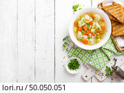 Vegetable soup with cauliflower, carrot, green peas, onion and potato. Стоковое фото, агентство Ingram Publishing / Фотобанк Лори