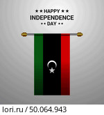 Libya Independence day hanging flag background. Стоковая иллюстрация, агентство Ingram Publishing / Фотобанк Лори