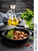 Fried mushrooms, champignons in pan. Стоковое фото, агентство Ingram Publishing / Фотобанк Лори