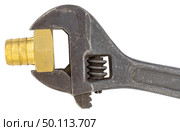 Водопроводный кран и гаечный ключ на белом фоне.  Water faucet and a wrench on a white background.d. Стоковое фото, фотограф Татьяна Д / Фотобанк Лори