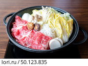 Japanese wagyu beef Sukiyaki set ready to cook. Стоковое фото, агентство Ingram Publishing / Фотобанк Лори