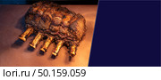 Wagyu beef roast prime rib, Carving food, panoramic crop for web banner. Стоковое фото, агентство Ingram Publishing / Фотобанк Лори