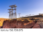 Power plant house and power line over Electricity generating dam in Page Arizona USA. Стоковое фото, агентство Ingram Publishing / Фотобанк Лори