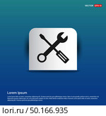 Wrench And Screw Driver Icon - Blue Sticker button. Стоковая иллюстрация, агентство Ingram Publishing / Фотобанк Лори