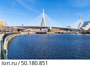 Boston Zakim bridge at Boston downtown MA USA. Стоковое фото, агентство Ingram Publishing / Фотобанк Лори