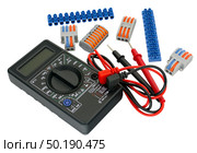 Цифровой мультиметр на белом фоне. Digital  multimeter on a white background. Стоковое фото, фотограф Татьяна Д / Фотобанк Лори