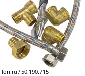 Разводной ключ, краны и фитинги на белом фоне. Diverter wrench, faucets and fittings on white background. Стоковое фото, фотограф Татьяна Д / Фотобанк Лори