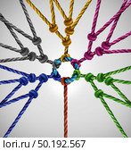 Connected to network groups as an individual connecting to diverse teams coming together to a central point as an abstract communication concept with linked ropes of different colors as a metaphor for social connection. Стоковое фото, агентство Ingram Publishing / Фотобанк Лори