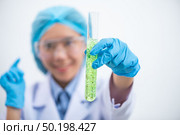 Biofuel research process in laboratory, Microalgae Photobioreactor for alternative energy innovation in Renewable Energy Laboratory. Стоковое фото, агентство Ingram Publishing / Фотобанк Лори