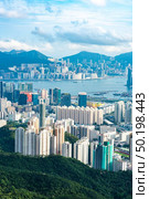 Hong Kong, China - August, 2019: Hong Kong city scape, modern building skyscraper in Hong Kong. Стоковое фото, агентство Ingram Publishing / Фотобанк Лори