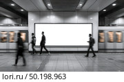 A group of people walk past a large white billboard in a subway station. Стоковое AI-изображение, AI-художник Ярославский Максим / Фотобанк Лори