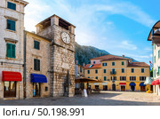 Clock Tower inside the old town of Kotor in Montenegro. Стоковое фото, агентство Ingram Publishing / Фотобанк Лори