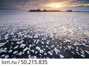 Rime on frozen ice. Nature composition. Стоковое фото, агентство Ingram Publishing / Фотобанк Лори