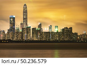 Shenzhen, Shenzhen Bay Park sunset scenery, skyline building city. Стоковое фото, агентство Ingram Publishing / Фотобанк Лори