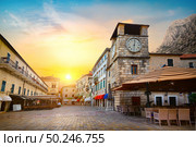 Clock Tower inside the old town of Kotor in Montenegro. Стоковое фото, агентство Ingram Publishing / Фотобанк Лори