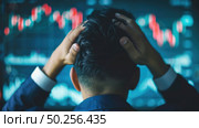 A man in a suit is intently studying a stock chart, closely examining the data to make informed financial decisions. Стоковое AI-изображение, AI-художник Данила Большаков / Фотобанк Лори
