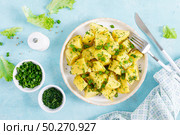 Boiled new potato with butter, dill and green onion. Стоковое фото, агентство Ingram Publishing / Фотобанк Лори