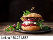 Sandwiches, hamburgers with homemade wholemeal bread, herring, puree of beetroot, red onion, parsley and fresh lettuce salad. Стоковое фото, агентство Ingram Publishing / Фотобанк Лори
