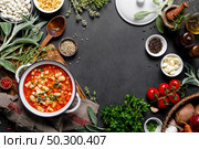 Cooking pasta e fagioli soup with chicken meat and vegetables, italian cuisine. Стоковое фото, агентство Ingram Publishing / Фотобанк Лори