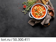Cooking pasta e fagioli soup with chicken meat and vegetables, italian cuisine. Стоковое фото, агентство Ingram Publishing / Фотобанк Лори