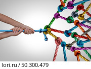 Network management and group business manager concept as a person holding a single rope pulling a large web of connected ropes tied together as a power and leader metaphor. Стоковое фото, агентство Ingram Publishing / Фотобанк Лори