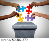 Puzzle vote as a political concept with voters holding jigsaw pieces at the ballot box voting in an election and campaign strategy with 3D illustration elements. Стоковое фото, агентство Ingram Publishing / Фотобанк Лори