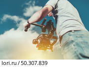 Taking Video Shoots Using DSLR Digital Camera Installed on the Pro Gimbal. Motion Picture Equipment and Work. Стоковое фото, агентство Ingram Publishing / Фотобанк Лори
