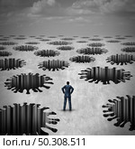 Risk of disease and health pitfall concept as a vulnerable businessman facing risky medical peril as deep holes shaped as an infectious virus with 3D illustration. Стоковое фото, агентство Ingram Publishing / Фотобанк Лори