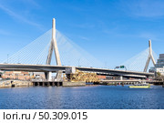 Boston Zakim bridge at Boston downtown MA USA. Стоковое фото, агентство Ingram Publishing / Фотобанк Лори