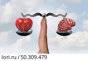 Heart and brain as a psychology symbol representing the balancing act between the rational logical mind and irrational emotional feelings with 3D render elements. Стоковое фото, агентство Ingram Publishing / Фотобанк Лори