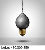 Ideas to change the world and disruptive idea or life changing renewal concept as a wrecking ball shaped as a lightbulb representing a game changer as a 3D render. Стоковое фото, агентство Ingram Publishing / Фотобанк Лори