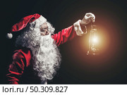 Portrait of Man in Santa Claus Costume. Стоковое фото, агентство Ingram Publishing / Фотобанк Лори