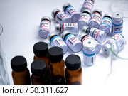 virus vaccine on white background in science laboratory, coronavirus COVID-19 disease medicine infection epidemic flu, health care research. Стоковое фото, агентство Ingram Publishing / Фотобанк Лори