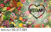Vegan love and vegetarian fresh fruit and vegetable behind a cold glass with condensation and natural raw fruits and vegetables as healthy organic food in a refrigerator as a veganism symbol for good nutrition in a 3D illustration style. Стоковое фото, агентство Ingram Publishing / Фотобанк Лори