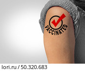 Vaccinated person and immune people due to taking the first dose and second booster medicine as an arm with a vaccination stamp as a vaccine passport symbol in a 3D illustration style. Стоковое фото, агентство Ingram Publishing / Фотобанк Лори