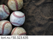close up dirty baseballs with copy space. Стоковое фото, агентство Ingram Publishing / Фотобанк Лори