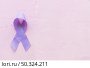 epilepsy awareness symbol pink backdrop. Стоковое фото, агентство Ingram Publishing / Фотобанк Лори