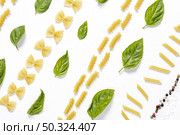 flat lay pasta arrangement white background. Стоковое фото, агентство Ingram Publishing / Фотобанк Лори