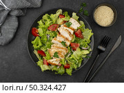 flat lay salad with chicken sesame seeds. Стоковое фото, агентство Ingram Publishing / Фотобанк Лори