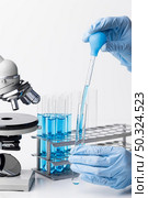 front view blue chemical substances lab. Стоковое фото, агентство Ingram Publishing / Фотобанк Лори