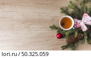 mug drink near coniferous twigs snags . Resolution and high quality beautiful photo. mug drink near coniferous twigs snags . High quality and resolution beautiful photo concept. Стоковое фото, агентство Ingram Publishing / Фотобанк Лори