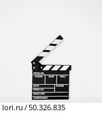 clapperboard white backdrop. Beautiful photo. clapperboard white backdrop. Стоковое фото, агентство Ingram Publishing / Фотобанк Лори