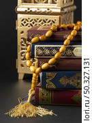 close up islamic new year with quran books. High resolution photo. close up islamic new year with quran books. High quality photo. Стоковое фото, агентство Ingram Publishing / Фотобанк Лори